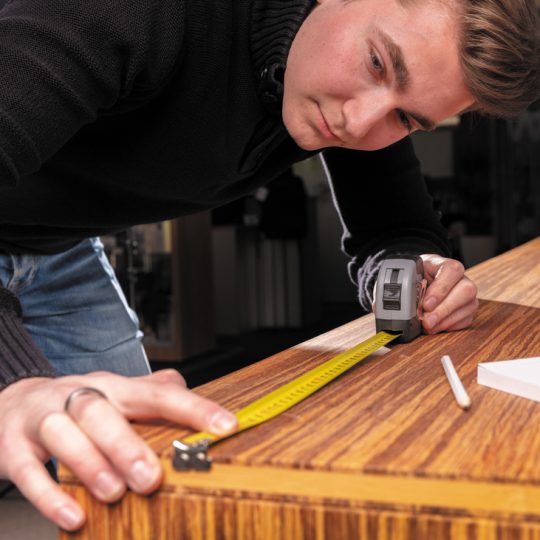 Flexómetro con mosquetón